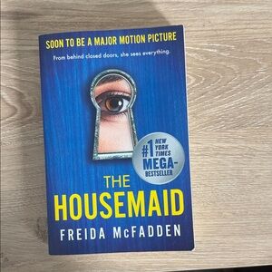 The Housemaid by Freida McFadden - Blue & Yellow Paperback